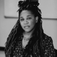 A black and white portrait of Tee Franklin, the writer behind Eat. Bang! Kill. Tour